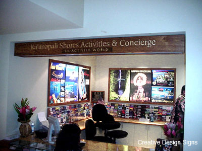 Ka'anapali Shores Activities Concierge - Dimentional gold leaf letters, stud mounted on framed teak.