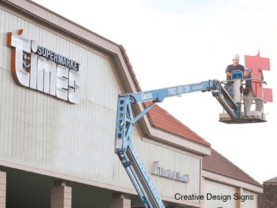 Times Market Installation - Removal of existing sign and installation of new store channel letter sign. Plexiglass faces, internally lit with LEDs.